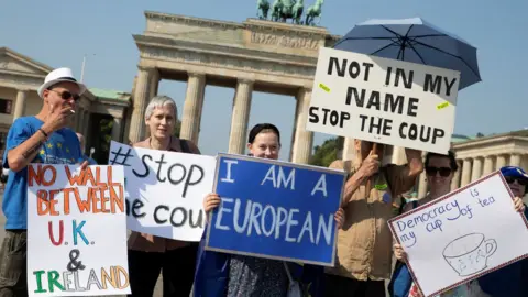 Reuters Activists protest against Brexit and the British Parliament suspension in front of Brandenburg Gate in Berlin, Germany