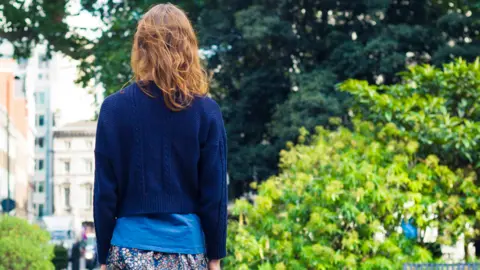 Getty Images A woman in a park