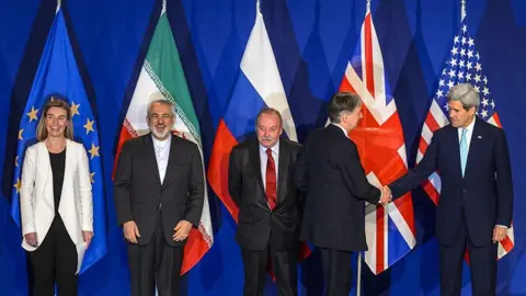 AFP/Getty Leaders pose for photos after agreeing the 2015 Iran nuclear deal