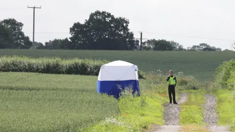 South Beds News Agency Police tent in field