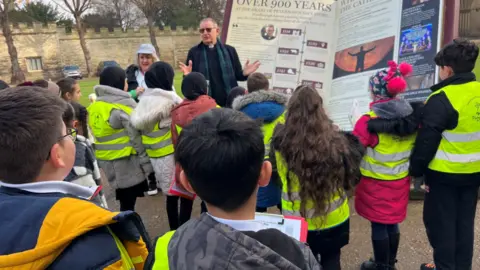 Maria Veronese/BBC Children on a treasure hunt in Peterborough