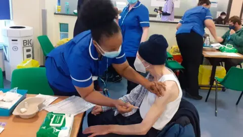 BLMK_CCGs Person being vaccinated