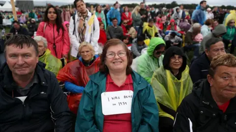 PA People gather in Phoenix Park for Mass with Pope Francis