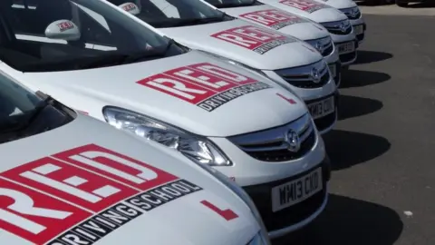 Red Driving School Red Driving School branded cars