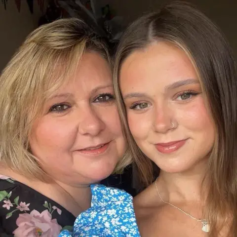 Angharad Evans Close up selfie of Angharad and Annie smiling. 