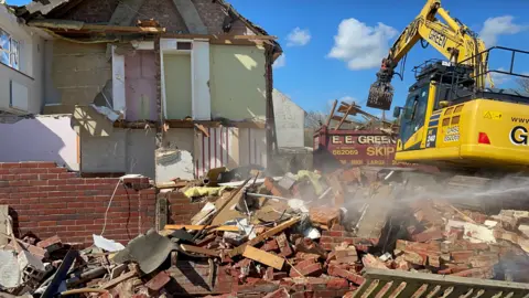 Edd Smith/BBC The wreckage of a home which is being demolished. 