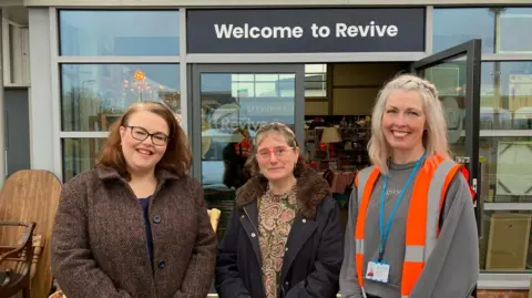 BBC Three women outside shop