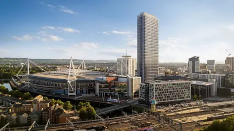 Blue Castle Capital Visualisation of the 50-storey planned proposal in Central Sqaure, Cardiff city centre. A large sky scraper can be seen next to the Principality stadium in daylight, along with Cardiff's skyline and railway lines.