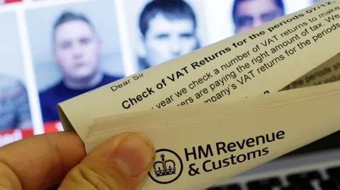 Getty Images An image of a HMRC letter in front of a computer
