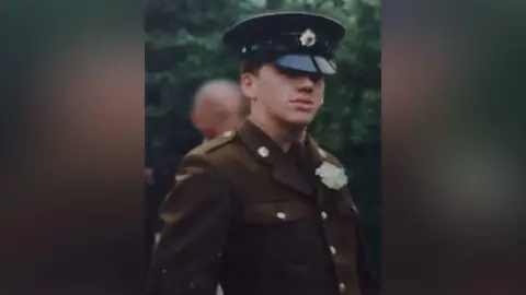 Kent and Medway Mental Health NHS Trust provides A young man in a British military uniform.