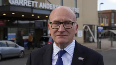 John Fairhall/BBC Nick Hulme outside Ipswich Hospital