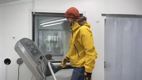 Sam Cox on a treadmill in the chamber
