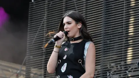 Getty Images Singer Dua Lipa performed at Donauinselfest in 2016