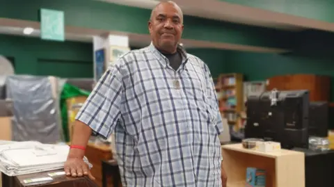 PLASTER Emmaus Bristol resident Kevin, inside the charity’s shop in Bedminster