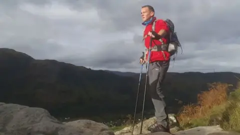 Andy Cole/PA Andy Cole on Ben Nevis