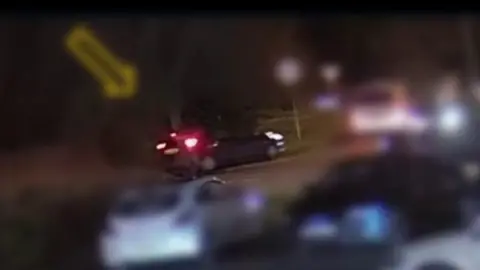 CCTV footage of a car suspected to be used in the shooting of John Caldwell