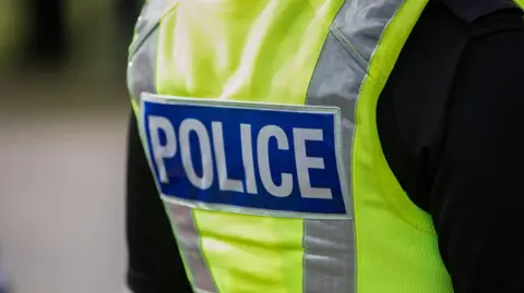 Close up of police uniform 