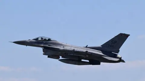 An F-16 fighter jet takes off during a Nato military exercise in Germany in June