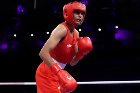 Getty Images Jaismine of Team India looks on during the Women's 57kg preliminary round match between Jaismine of Team India and Nesthy Petecio of Team Philippines on day four of the Olympic Games Paris 2024 at North Paris Arena on July 30, 2024 in Paris, France. (Photo by Richard Pelham/Getty Images)