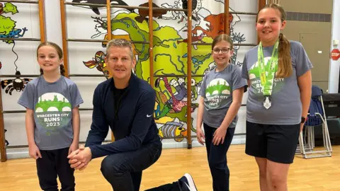 BBC Steve Cram and pupils