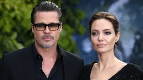 PA Media Brad Pitt and Angelina Jolie