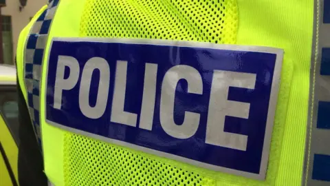 BBC A police hi-vis
