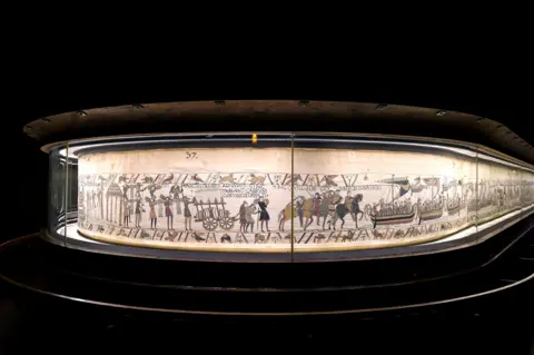Bayeux Museum Bayeux Tapestry behind glass in Bayeux