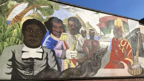 A picture of part of the mural on the side of the Central Club