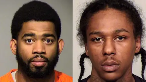 Police Dominique Heaggan-Brown (L) and Sylville Smith