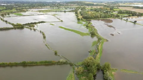 Reuters A drone view shows flooded fields following heavy rain, near Bicester