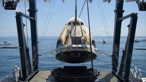 NASA/Bill Ingalls Dragon capsule