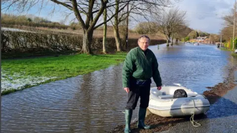 Jerry Marshall Peter Higson after evacuation by boat