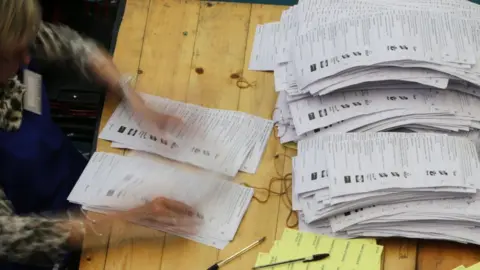 Getty Images Ballot papers counted in an NI Assembly election