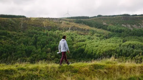 Mike Erskine Ian Thomas walking on a hill