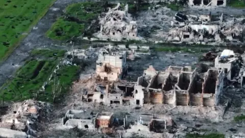 Telegram via Reuters A drone view of a destroyed town of Mariinka, eastern Ukraine. Photo: May 2023