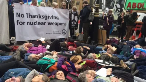 Protesters staging a 'die-in'