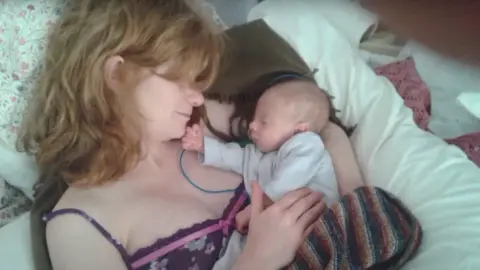 Accessible Iris Jemima and Cali in hospital after Cali's birth