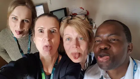 NSFT/Charlotte Loades Central Acute Nurses Sticking out tongues out for brave Sophie