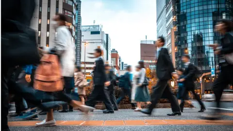 Getty Images People walking in a street