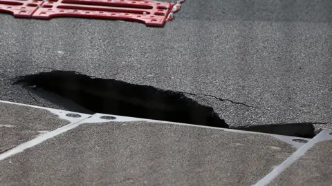 South Beds News Agency Sinkhole by entrance to Watford General Hospital