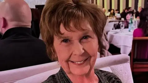 Nancy Guthrie smiles in an undated photo 