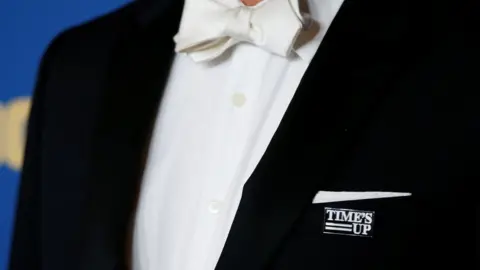 Reuters Actor Bradley Whitford wearing a "time's up" pin at the Director's Guild Awards