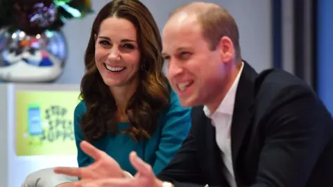 Getty Images The royals laugh during the visit to BBC