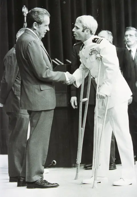 Getty Images Lieutenant Commander John Mccain Is Welcomed By U.S. President Richard Nixon Upon Mccain's Release From Five And One-Half Years As A P.O.W. During The Vietnam War May 24, 1973 In Washington, D.C