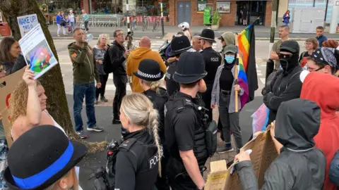 BBC Protestors outside a library