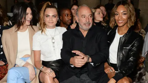 Getty Images Philip Green with Kendall Jenner, Cara Delevingne and Jourdan Dunn at London Fashion Week 2015