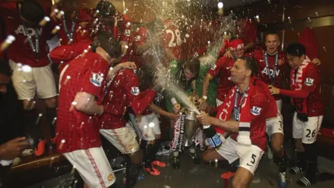 Getty Images Man United team winning the Premier League