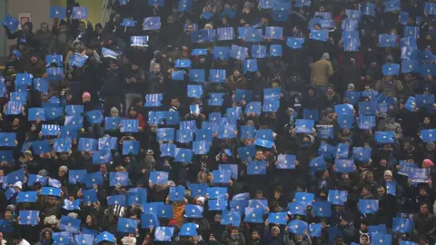 Getty Images Fans of FC Internazionale cheer their team during the Serie A match between FC Internazionale and SSC Napoli at Stadio Giuseppe Meazza on December 26