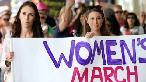 Getty Images Jacinda Ardern and Lizzie Marvelly join a Women's March (Jan 2017)