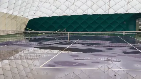 BBC Flooded tennis courts